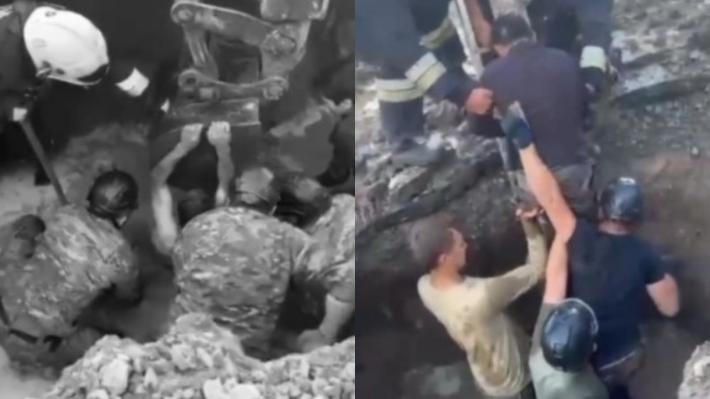 Рабочего засыпало грунтом в Караганде: кадры спасения