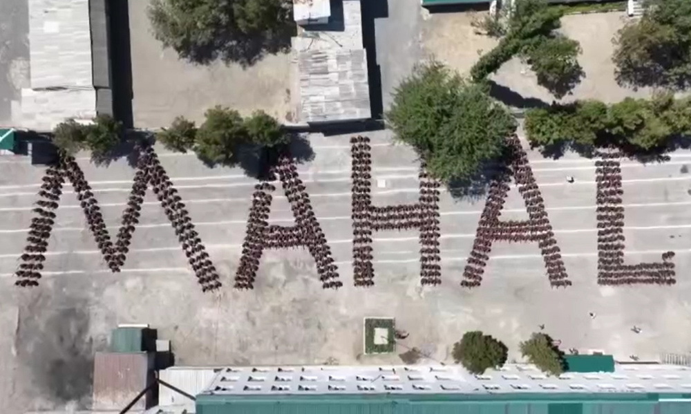 Эпичное видео: сотни заключенных в колонии выстроились в слово "Манас"