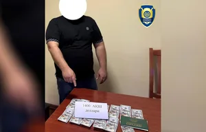 В Хорезме чиновника задержали при получении денег за обещание помочь с поступлением в вуз
